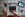 Young woman using laptop, paying with credit card, travel booking